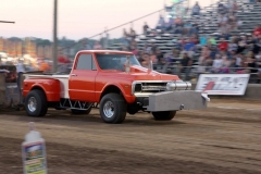 Ben Kleppinger/ben.kleppinger@amnews.com
A souped up truck races past spectators.